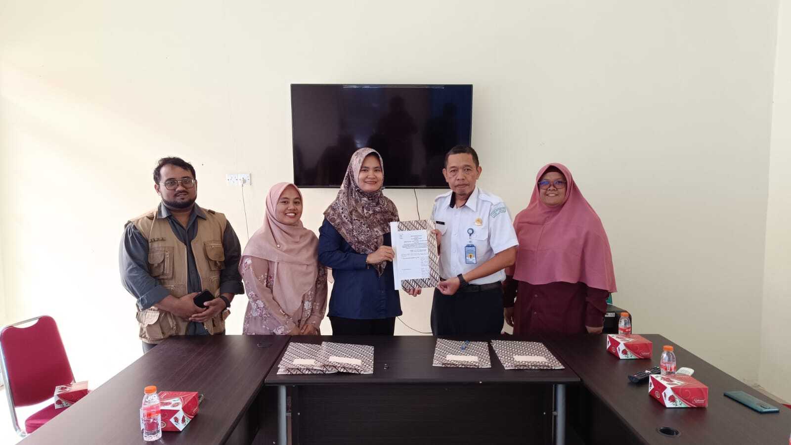 Penandatangan_PKS_PPB_dg_BMKG_Dabo_Singkep_(1).jpg